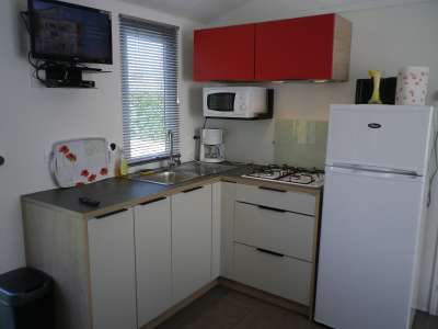 © chalet d'accueil Piscine Camping Les Acacias_Clion espace wifi gratuit ouvert 24/7 plan camping.jpg bloc sanitaire n°1 lave-linge mobil-home 27 m² cuisine mobil-home séjour mobil-home chambre n° 1 mobil-home chambre n° 2 mobil-home plan-mobil-home.jpeg boulodrome table de ping-pong bloc sanitaire n°2